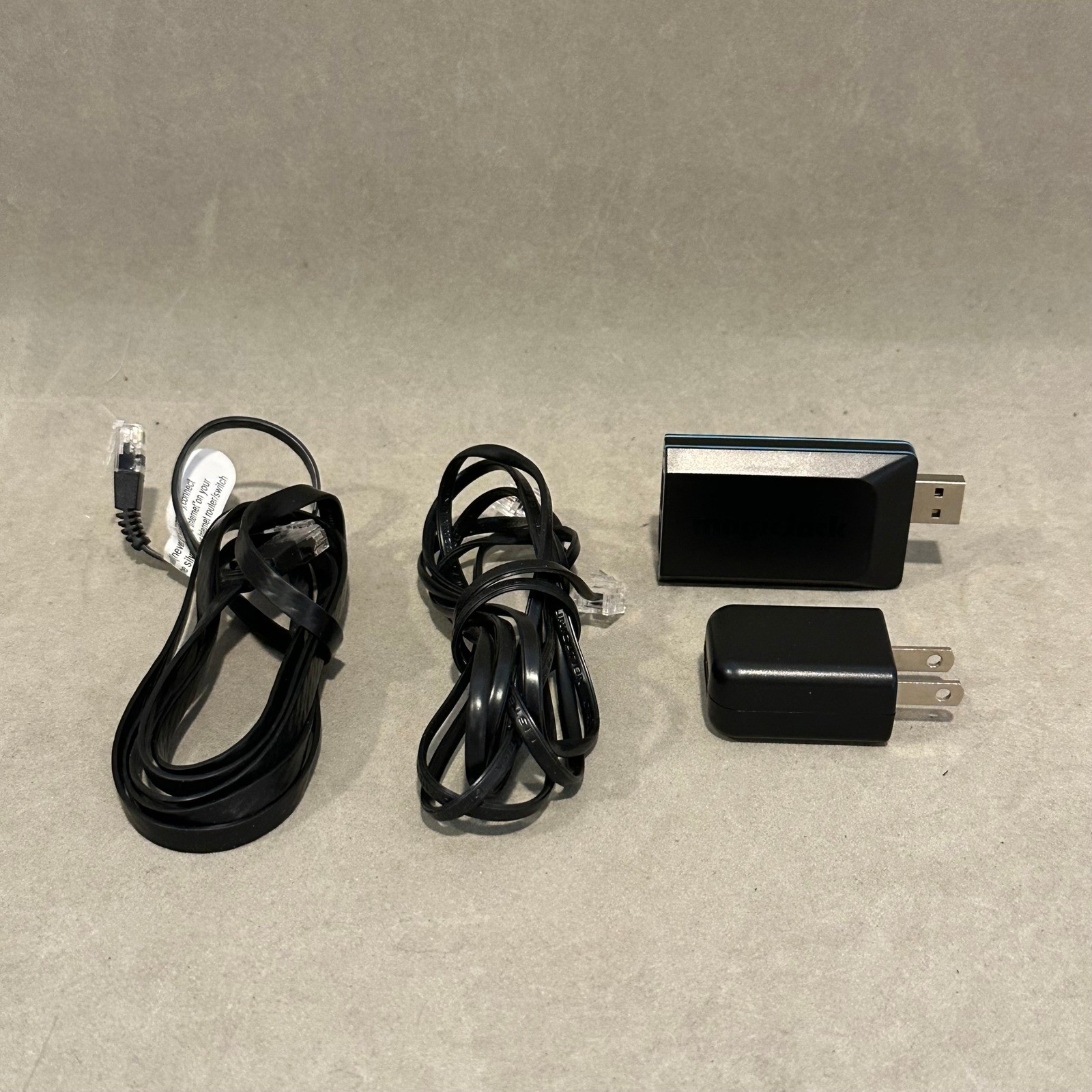 magicJack Home VoIP Phone Service Adapter with USB Power Plug and Cables Black