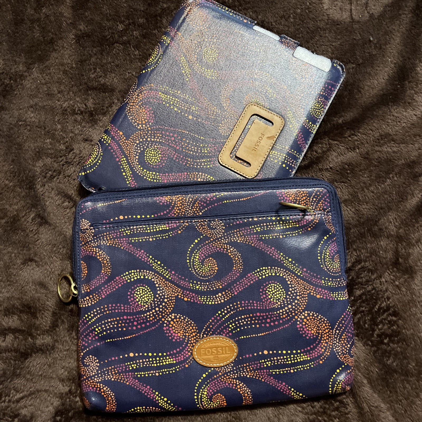 a Fossil Key-Per navy blue swirl-dots coated canvas tablet case and pouch set 