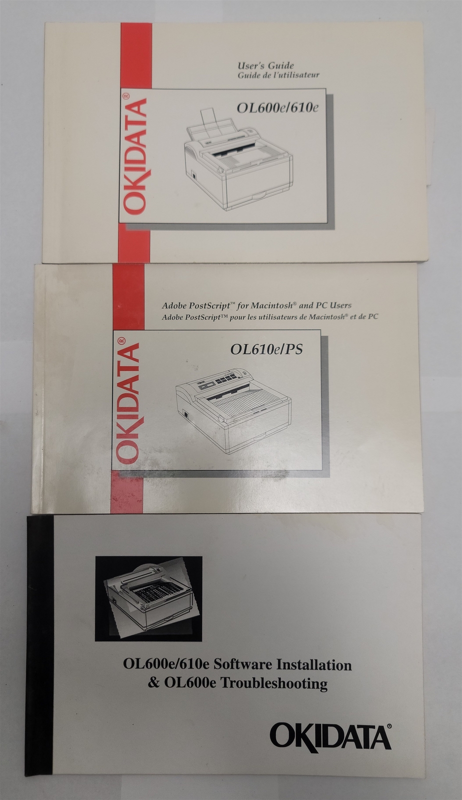Okidata OL610e/610e User's Guide + Troubleshooting + Adobe PostScript Guide