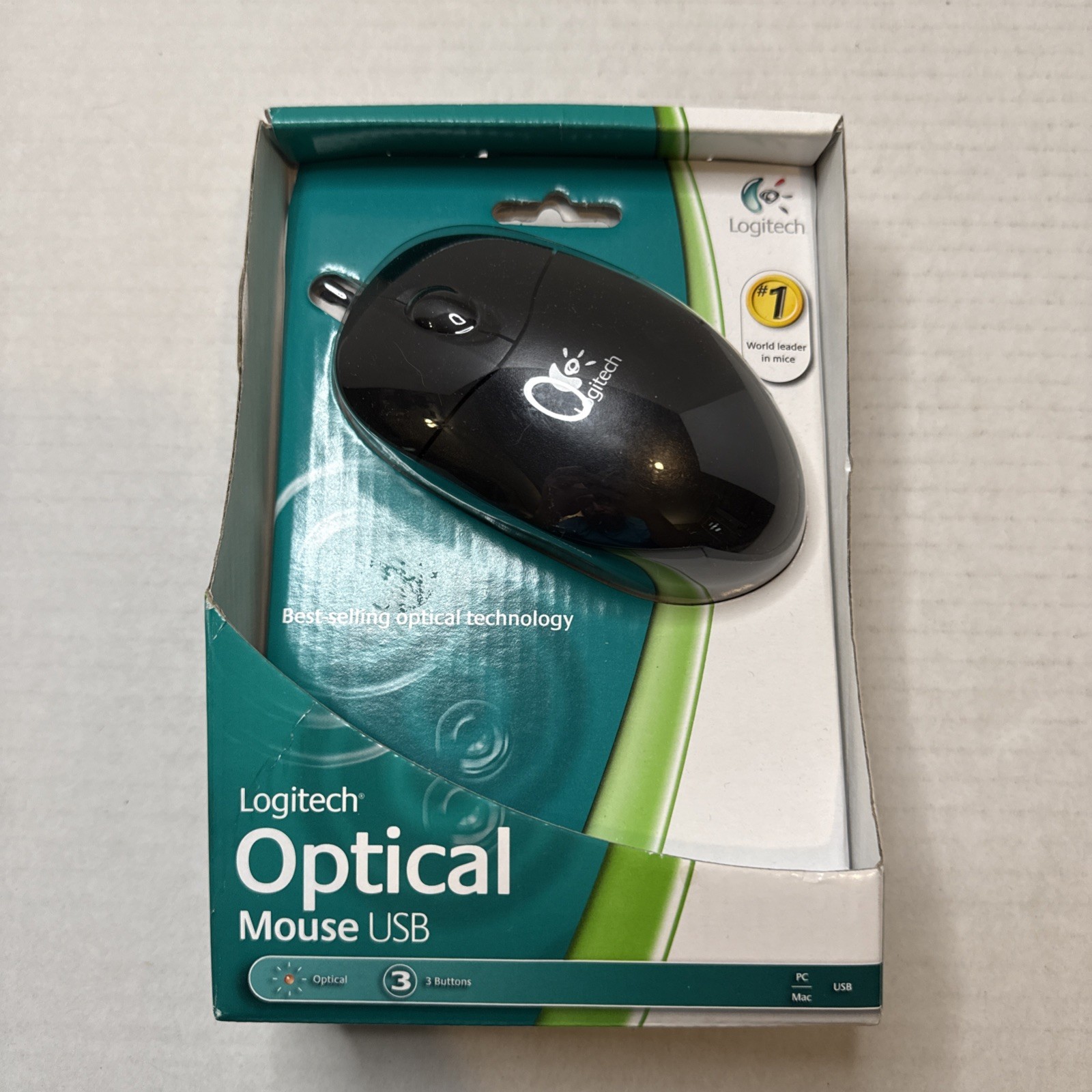 Logitech 931369-0403 3 Buttons, Scroll Wheel, USB Optical Mouse In Black Color