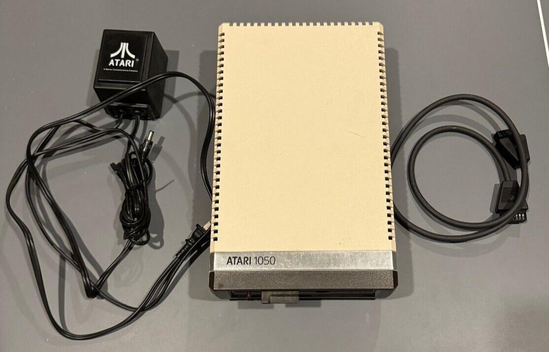 Atari 1050 Disk Drive with Serial I/O Cable and Power Adapter - Powers On