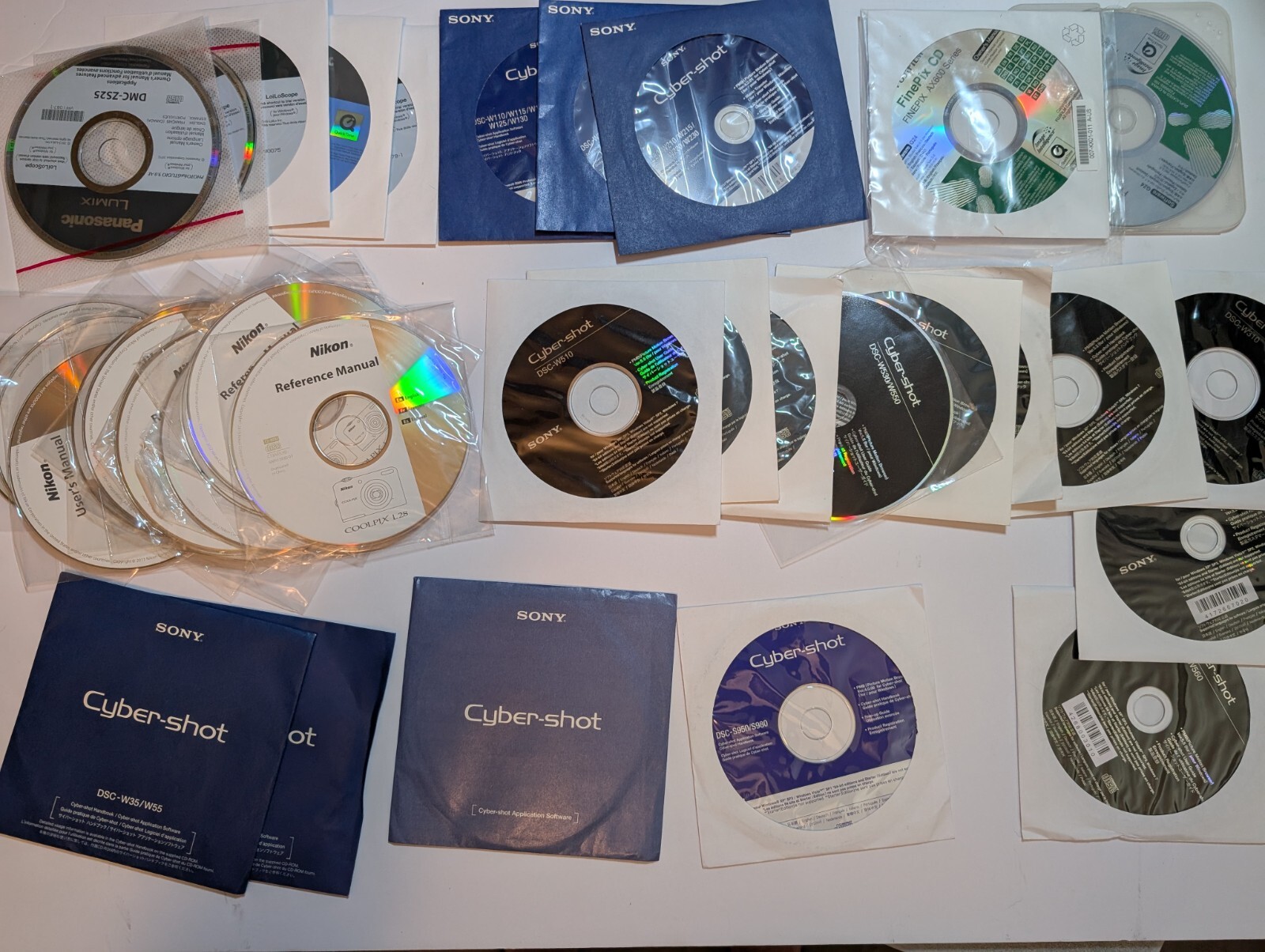 Lot of 35 Compact Camera Software Discs CD's Nikon Panasonic Sony Fujifilm