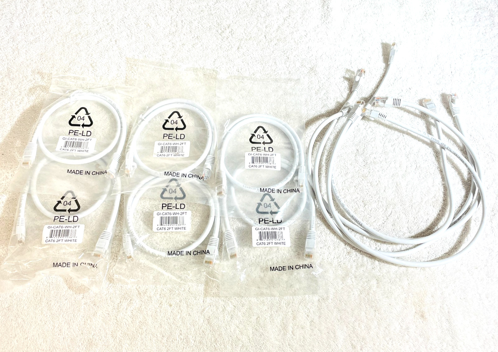 10 Pack - 2ft UTP CAT6E Ethernet Network Patch Cables (White), 6 In Pack; 4 Open
