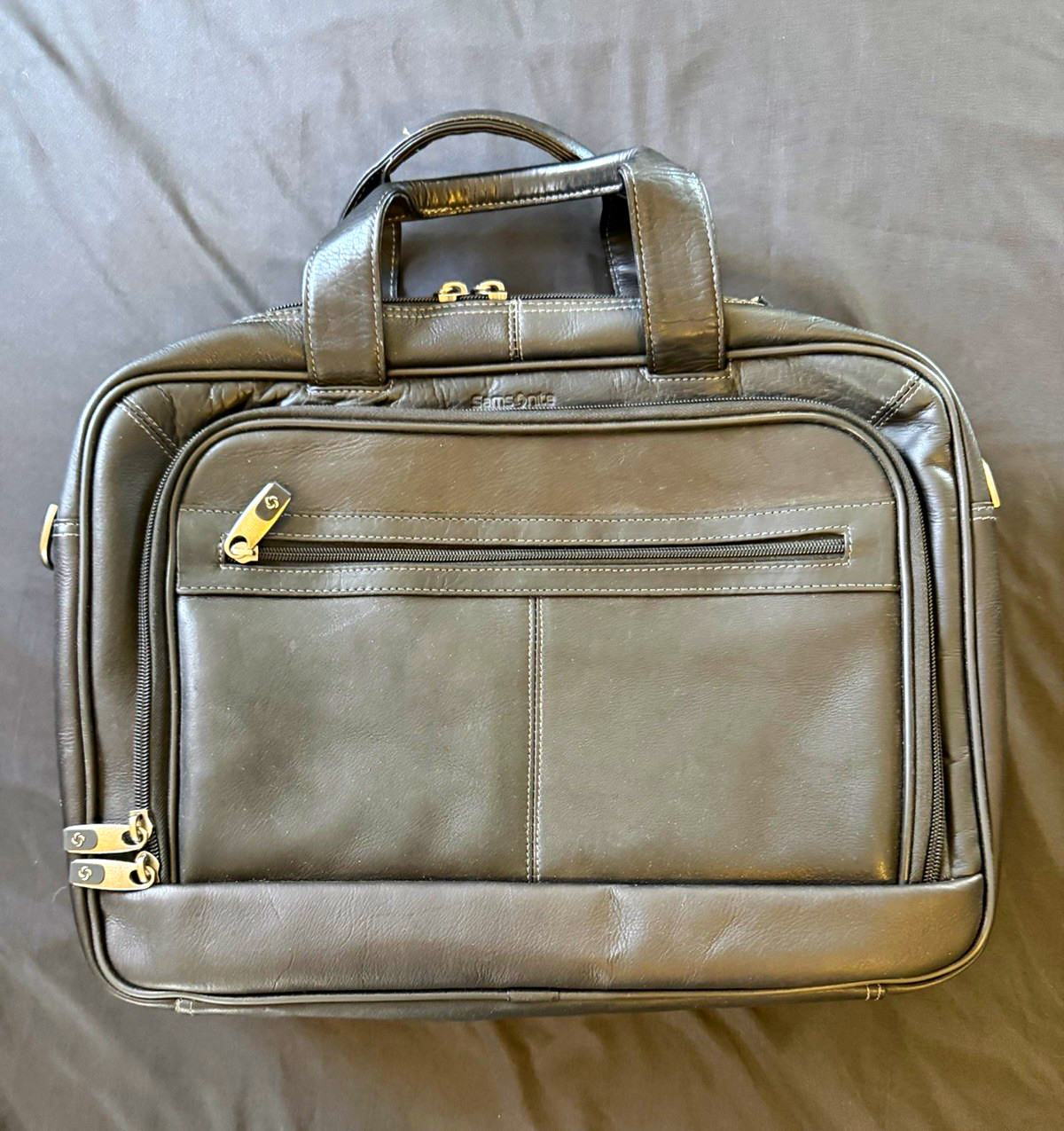 Samsonite Black Leather Padded Briefcase for 15.6in Laptop, Solid(description)