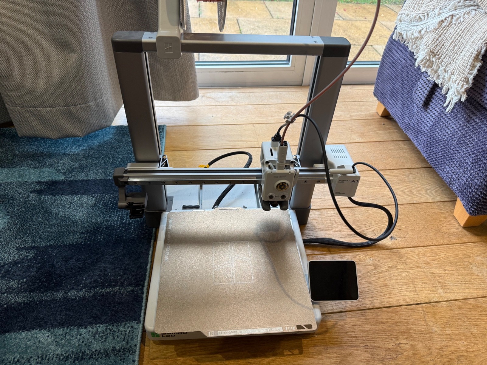 bambu labs A1 3d printer (2 nozles + build plate + maintanance kit)