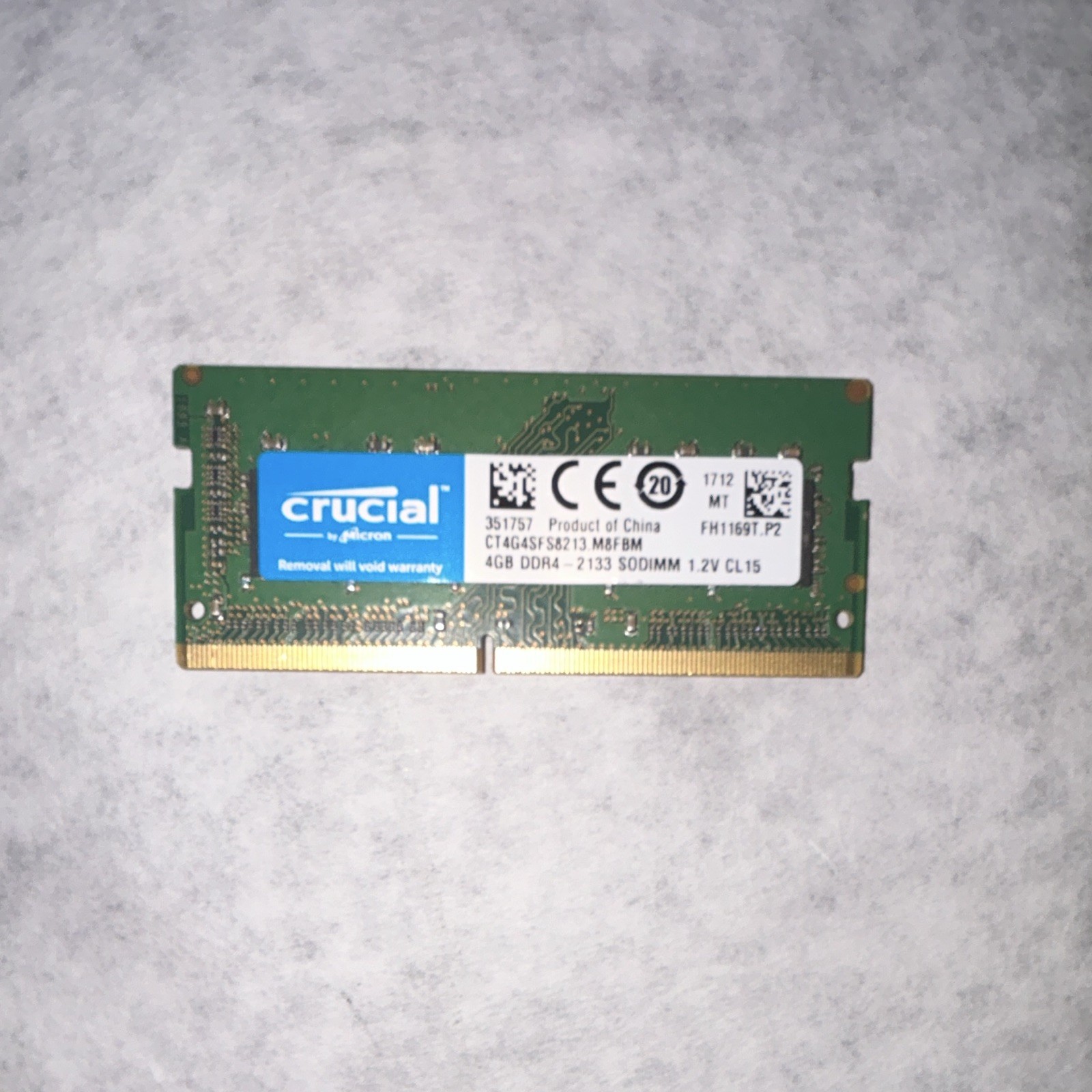 Micron 4GB DDR4 SO-DIMM laptop RAM stick (Model: MTA8ATF51264HZ-2G1B1).