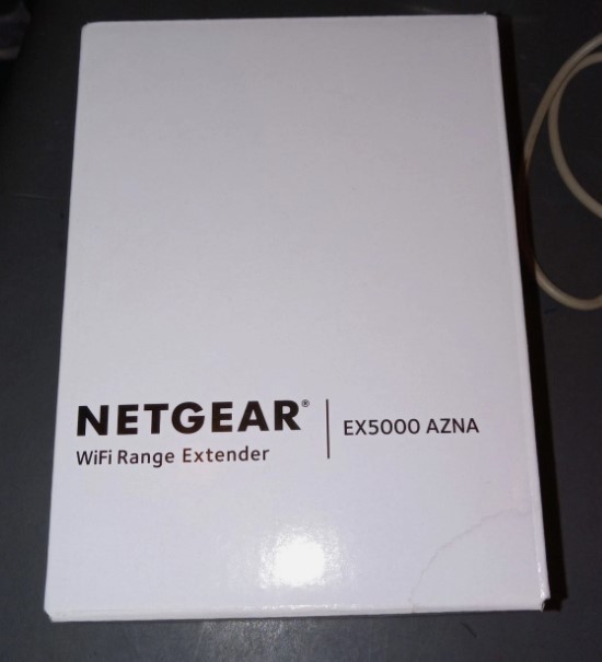 NETGEAR EX5000 Wi-Fi Range Extender Open Box Never Used White Indoors