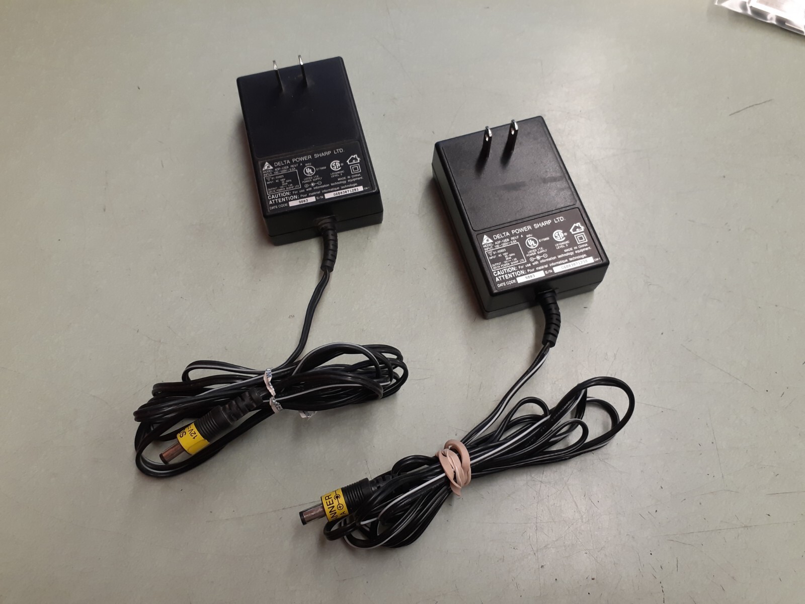(2) Delta Electronics Adapter Model ADP-12EB REV.F