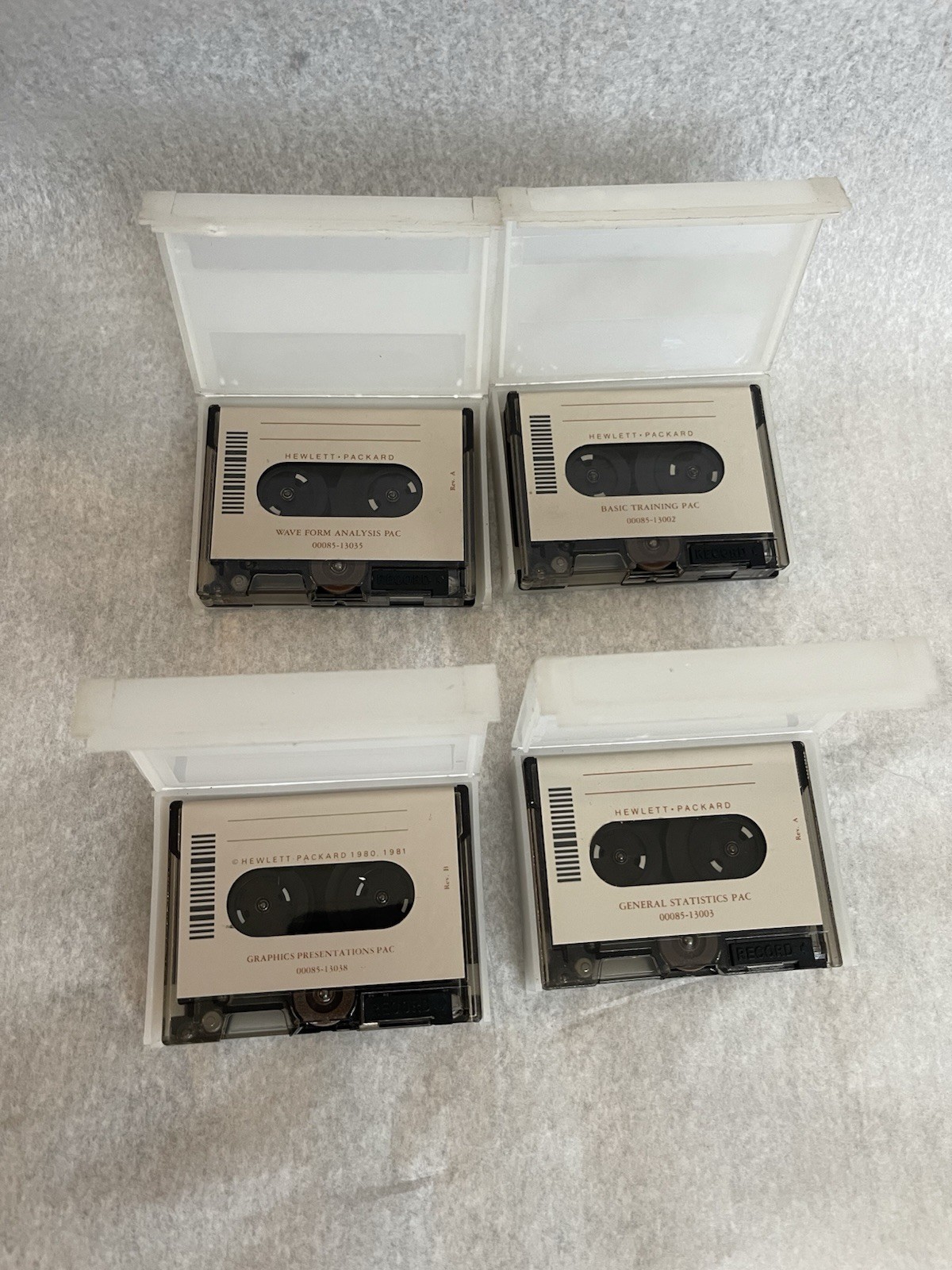 4 HEWLETT PACKARD HP-85 COMPUTER TAPE CARTRIDGES GEN  STATISTICS/BASIC TRAINING