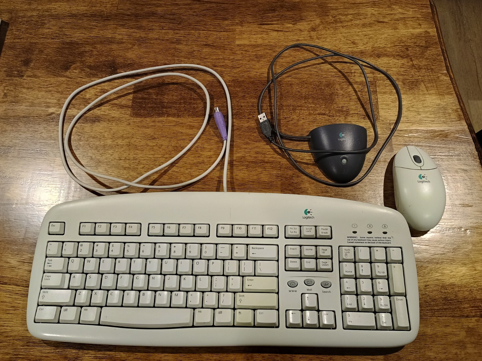 Logitech Deluxe Access 867091-0100 Wired Keyboard and Cordless Wheel Mouse USB