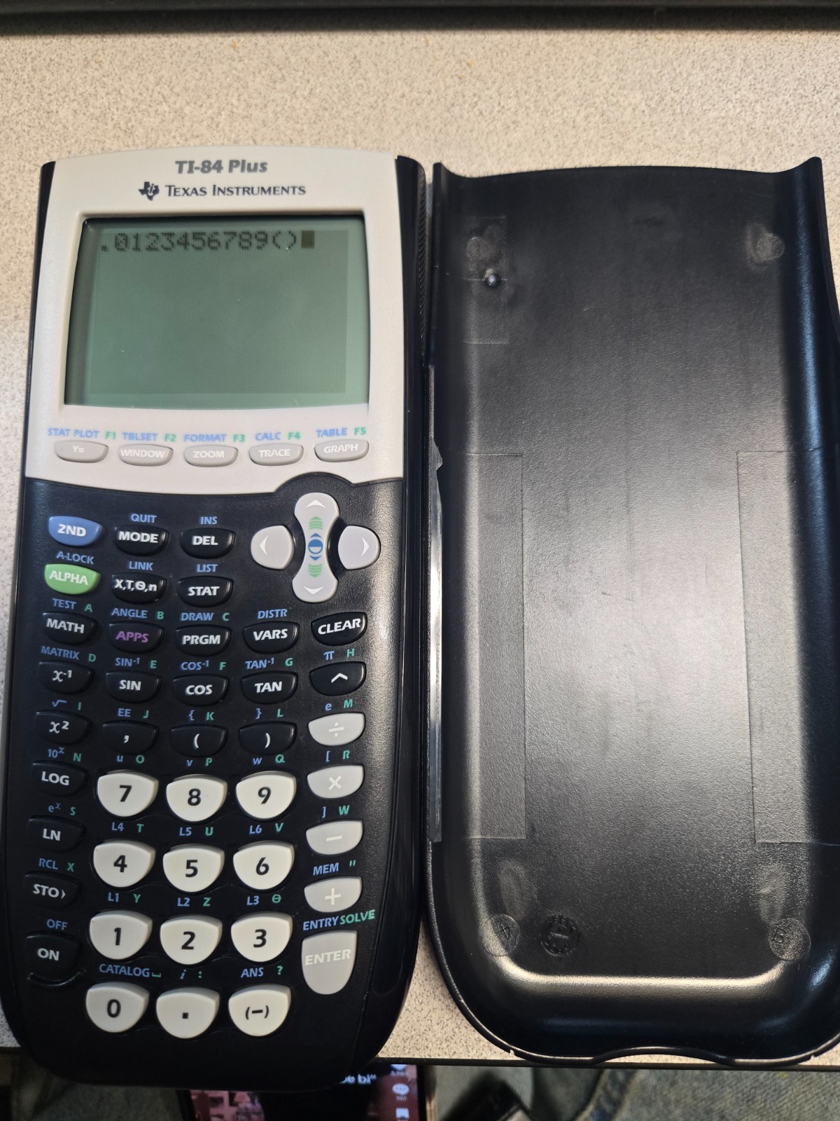 Texas Instruments TI-84 Plus Graphing Calculator *HAS ENGRAVINGS*