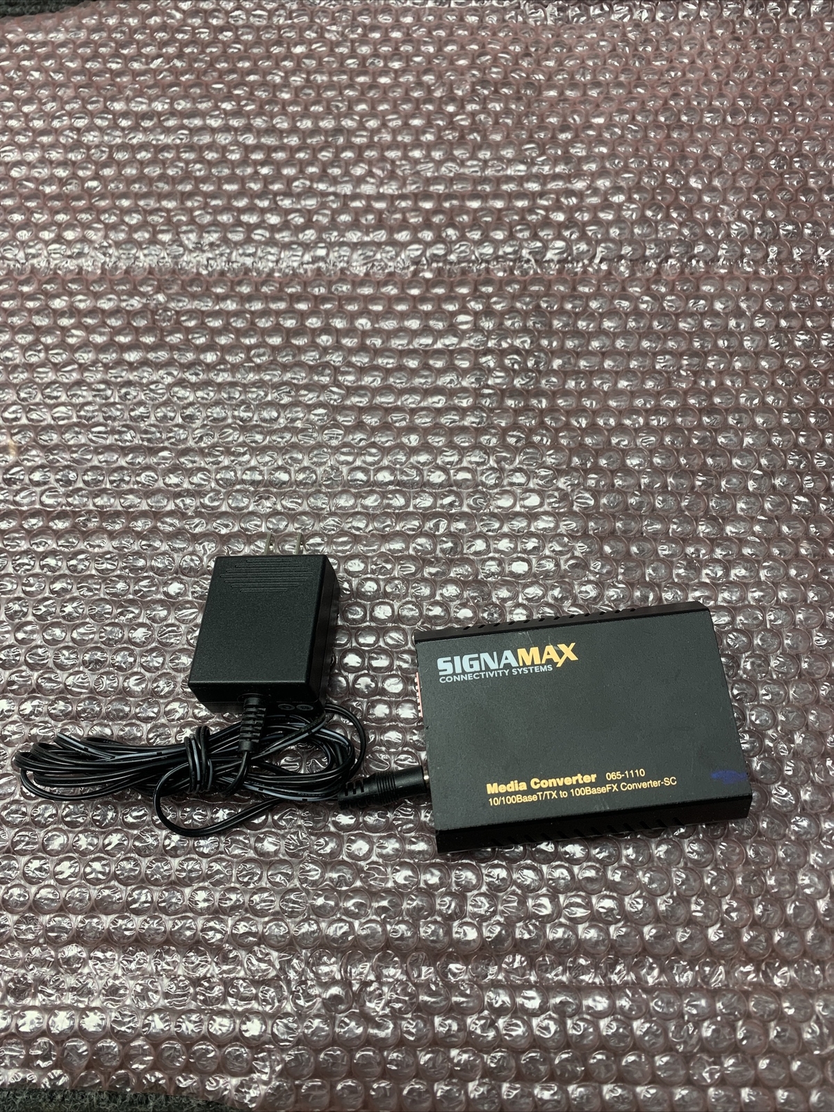 Used SIGNAMAX 10/100 Base T/TX FX Media Converter 065-1110