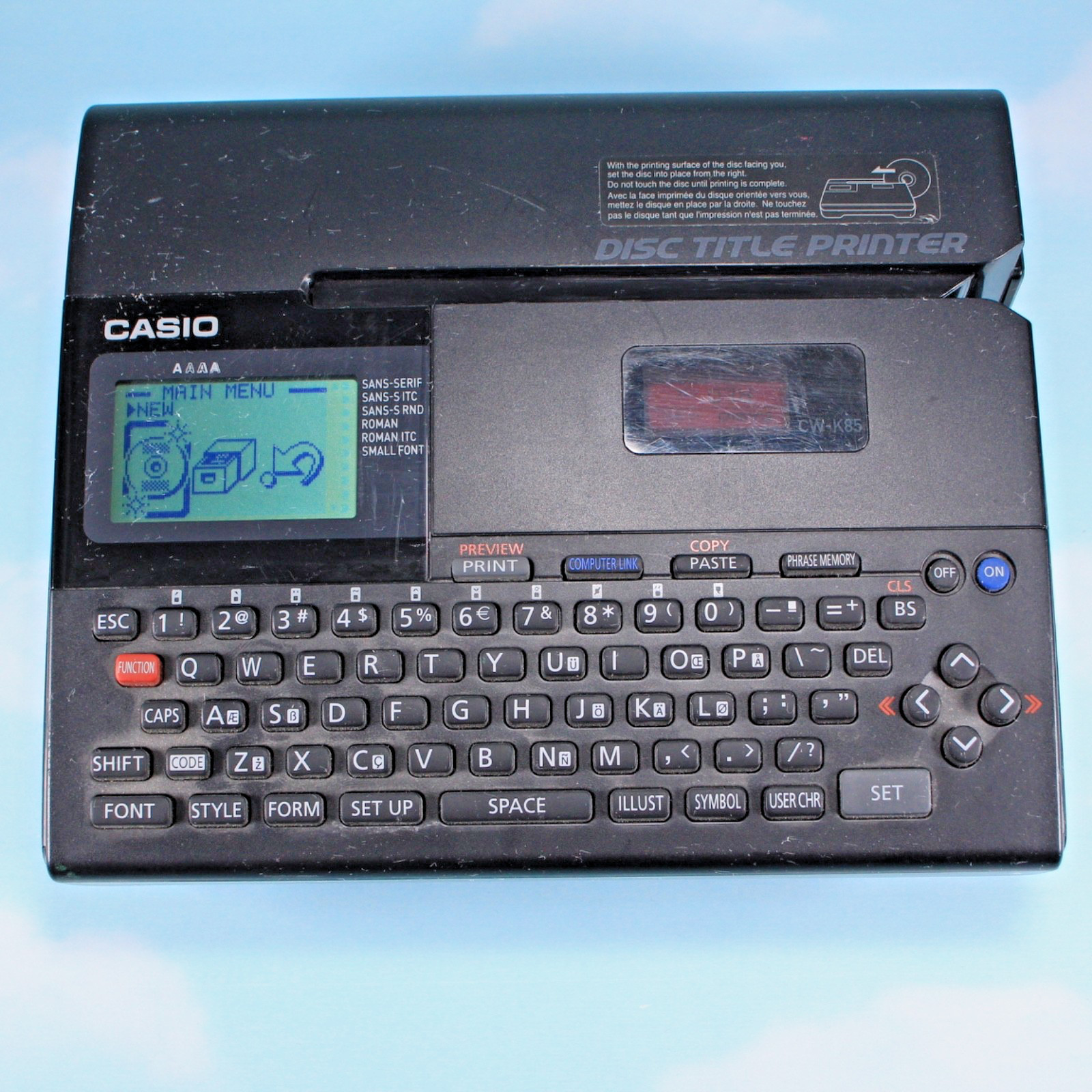 Casio CW-K85 Thermal Disc Title Printer Used - Tested & Working - Battery Only