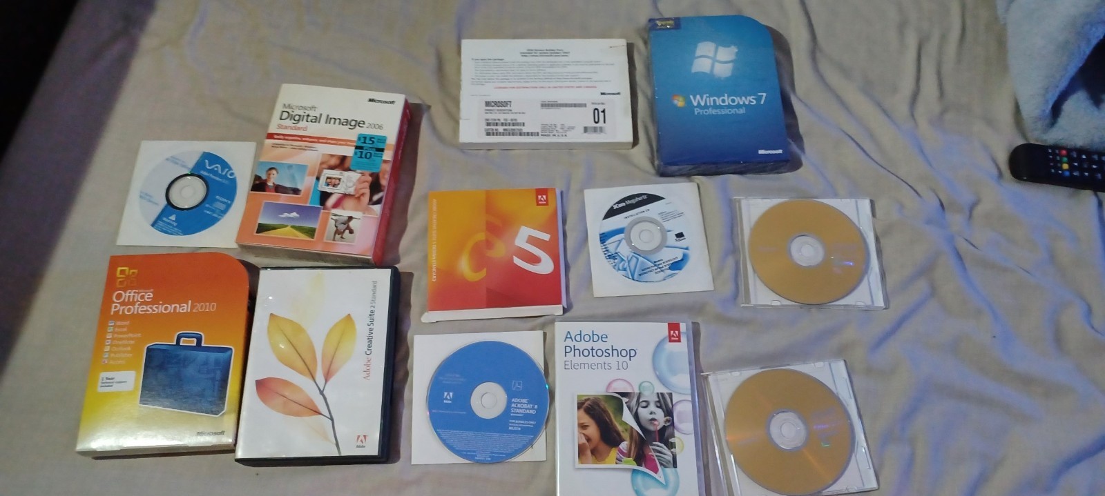 Perpetual Windows 7 Professional Software Lot: Microsoft & Adobe 18-Disc Lot