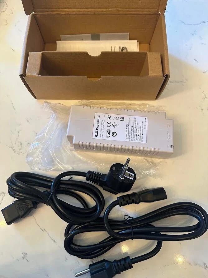 Open box- Microsemi model: PD-9501 GR/SP/AC Power over Ethernet DC injector 60W