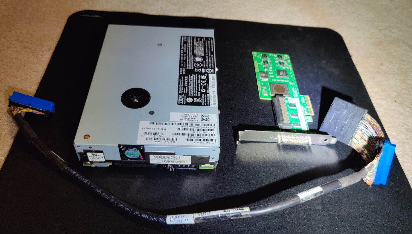 IBM LTO 3 internal tape storage system with SCSI I/F and cable.