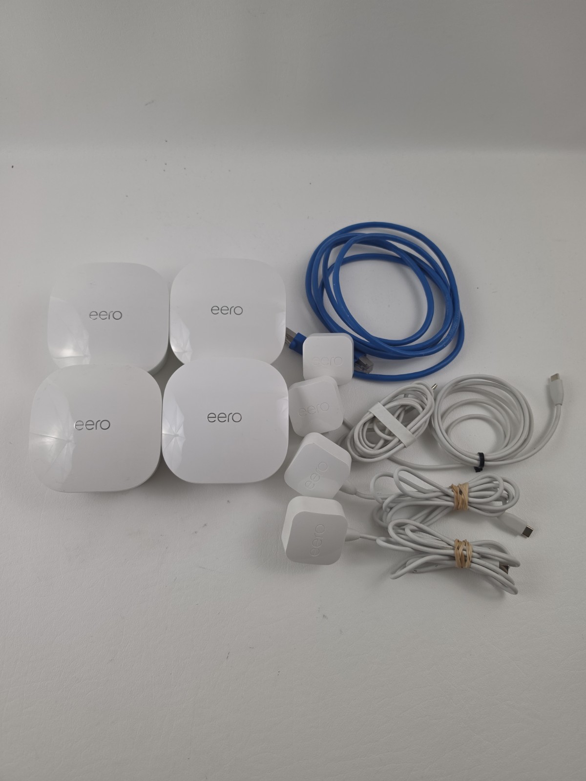 Eero Mesh WiFi System 4-Pack Model J010001 White Dual-Band Router Set with Cords
