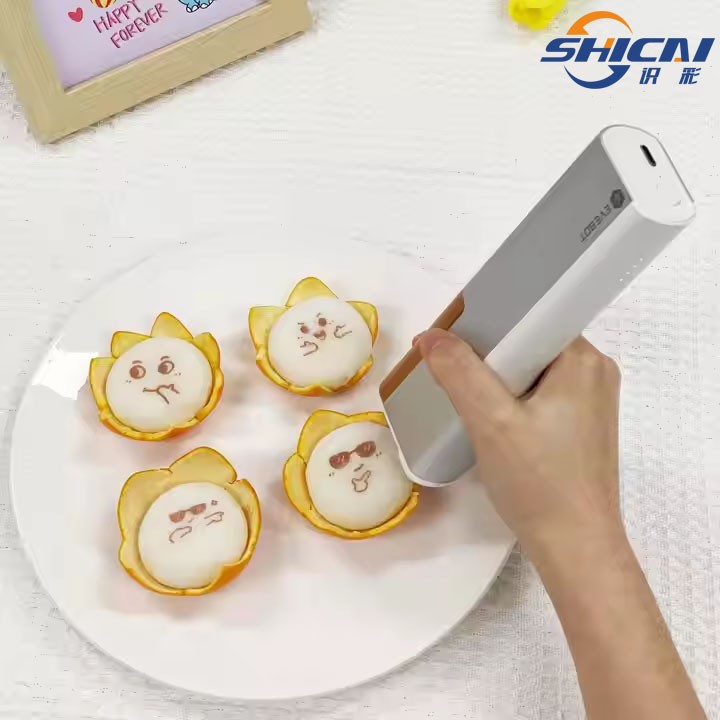 New handheld inkjet printer prints patterns, text, and numbers on food