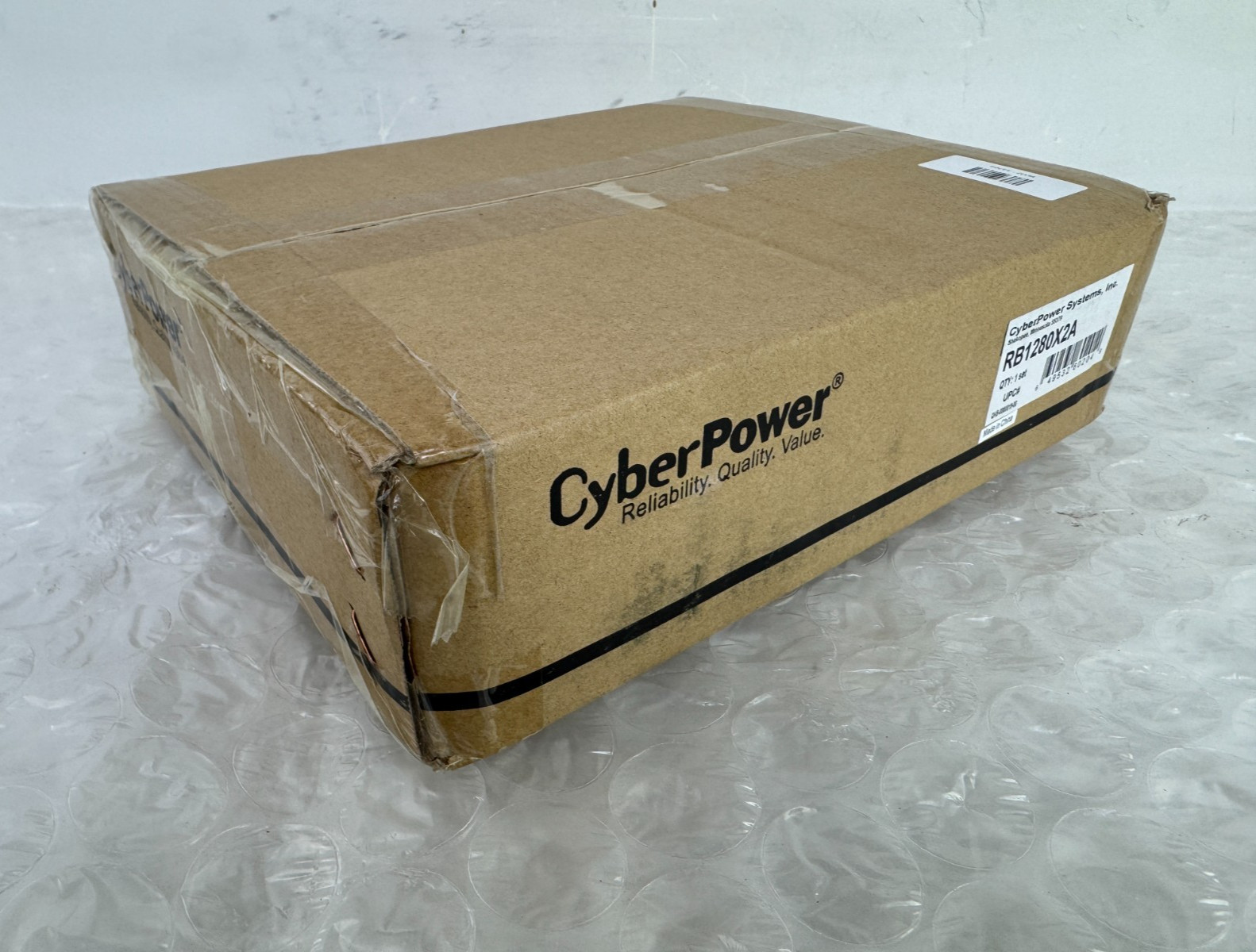 New in Box RB1280X2A UPS Replacement Battery Cartridge