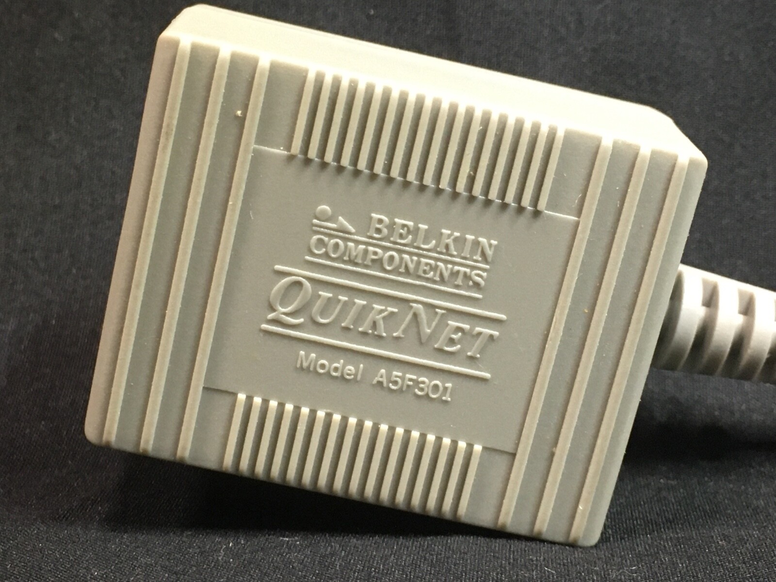 QuikNet Belkin Components Model A5F301 - 8-Pin Mini-DIN Male to 2 RJ-11 Female