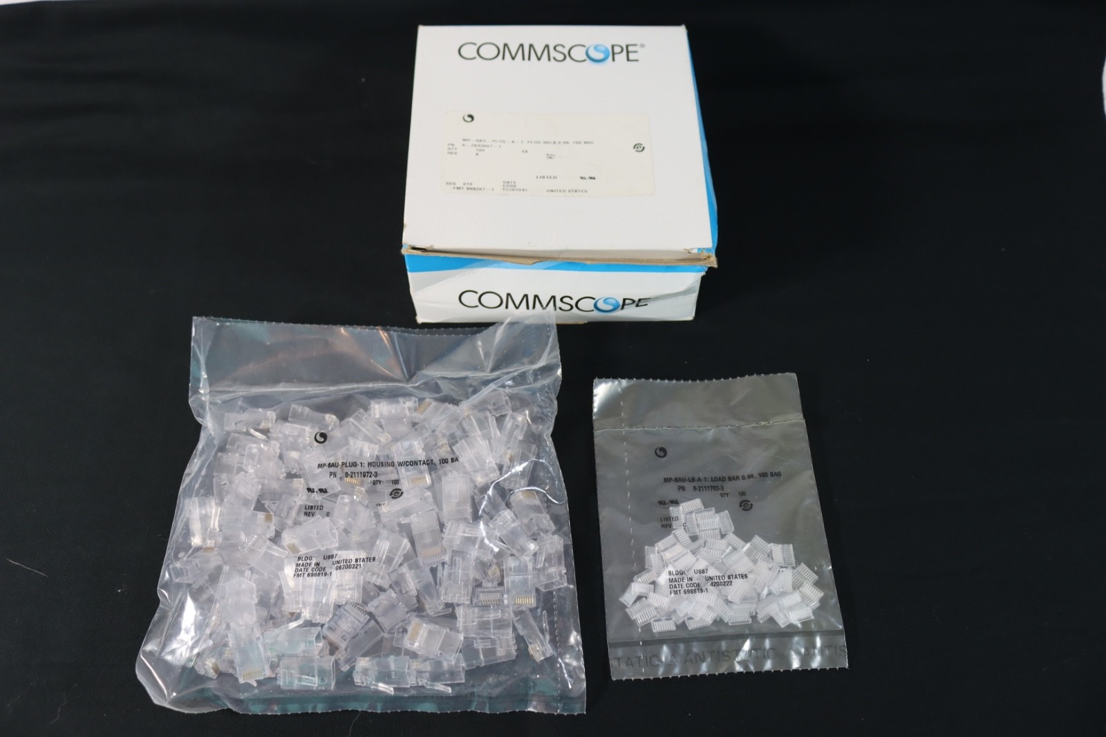 CommScope MP-6AU-Plug-1: Modular Plug Housing w/Load Bar RJ45 Cat 6 100pc Bags