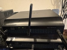 Cisco CISCO1941W-A/K9 WIRELESS Router 1941 Ver. 15.7(3)M9 Tested with rack Ears picture