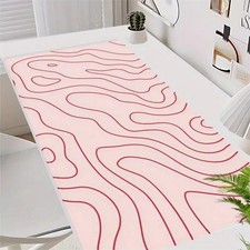 One Large Pink Gaming Mouse Pad with Ripple Stripe Pattern, Featuring a Non-Sl picture