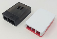 2x Raspberry Pi Cases (1x official red/white with fan, 1x Poly+) picture