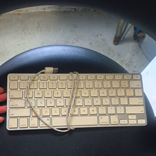Apple A1242 Compact Wired USB Aluminum Keyboard White/Silver English QWERTY picture