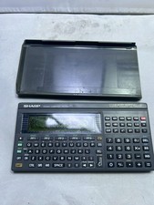 SHARP PC-E500 Pocket Computer Vintage Japan FOR PARTS OR REPAIR picture