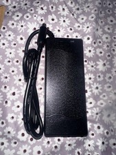 AC/DC adapter, specifically identified by the model number XVE-4200200 picture