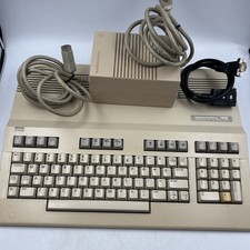 Vintage Commodore 128 Computer Powers On Not Tested with Power Supply AS-IS picture