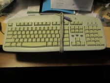 LOGITECH DELUXE ACCESS KEYBOARD RT7R11 V:58TW PS/2 WHITE W/ FADING picture