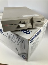Commodore 1571 Disk Drive w manual disks cables original box transit card pkg picture