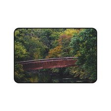 Rustic Red Bridge Desk Mat | Autumn Forest River Landscape picture