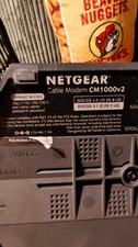 NETGEAR CM1000v2 DOCSIS 3.1 Cable Modem Bundle w/ Adapter & Cable - Used picture
