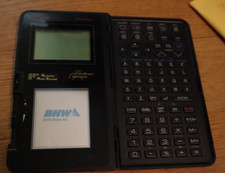 Sharp Electronic Organizer Sharp IQ-7100M wizard advanced micro systems flexard picture