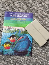 Texas Instruments TI-99 4A cartridge and manual, Alligator Mix Tested & Working picture