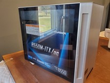 Lian Li TU150 Mini ITX PC w/motherboard, power supply, and Cpu cooler picture