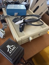 ATARI XF551 DISK DRIVE WITH AC POWER ADAPTER AND PARALLEL PORT ADAPTER, UNTESTED picture