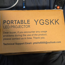 YGSKK Portable LED Projector 1080p FHD 16:9 HDMI USB Built-In Speakers picture
