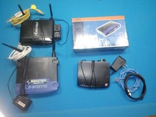 Lot of 4 Wireless Routers & hub. Lynksys wireless 2.4 zoom cable Actiontec rout picture