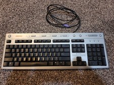 Vintage Compaq Wired PS/2 Keyboard  5187-5023 Silver Black picture