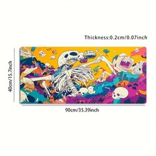 A Large Electronic Sports Gaming Mouse Pad Featuring a Vibrant Yellow Skull Ar picture