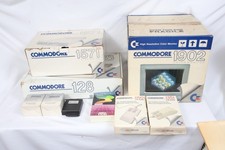 Commodore 128 Monitor 1902 Disk Drive 1571 (2) mouse 2 joysticks manual/software picture