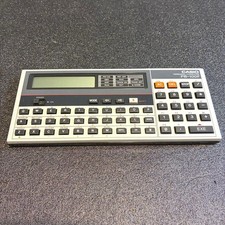 CASIO PB-100F Pocket Computer with QWERTY Keyboard Programmable picture