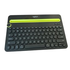 Logitech Black and Green Wireless Keyboard picture