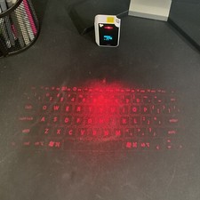Brookstone CTX (Model: VK200 Keyfob) BT Virtual Bluetooth Keyboard picture