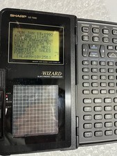 Sharp Wizard OZ-7000 Electronic Organizer PDA, Tested & Working picture